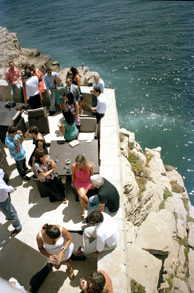 Guests on the balcony of the restaurant captured in film